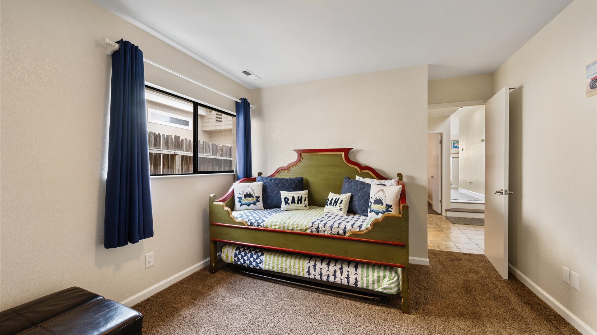 Third bedroom features 3 twin beds, a twin trundle and a folding twin out of the ottoman