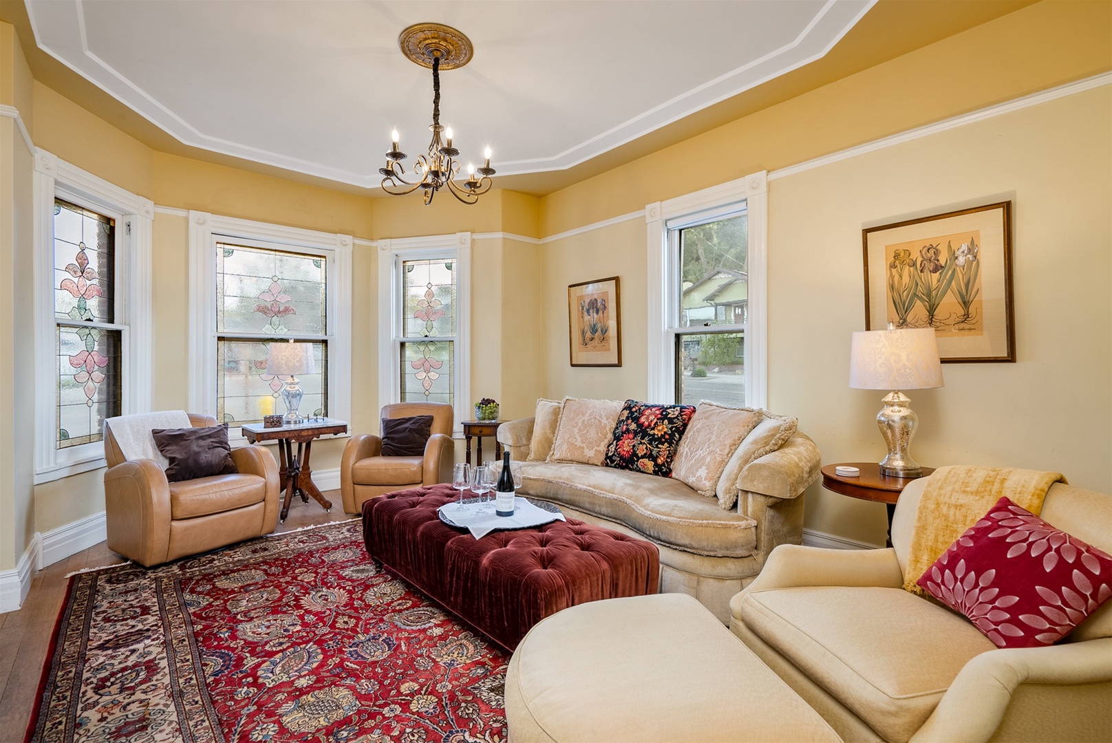 The beautiful front living area reflects the time period of the home