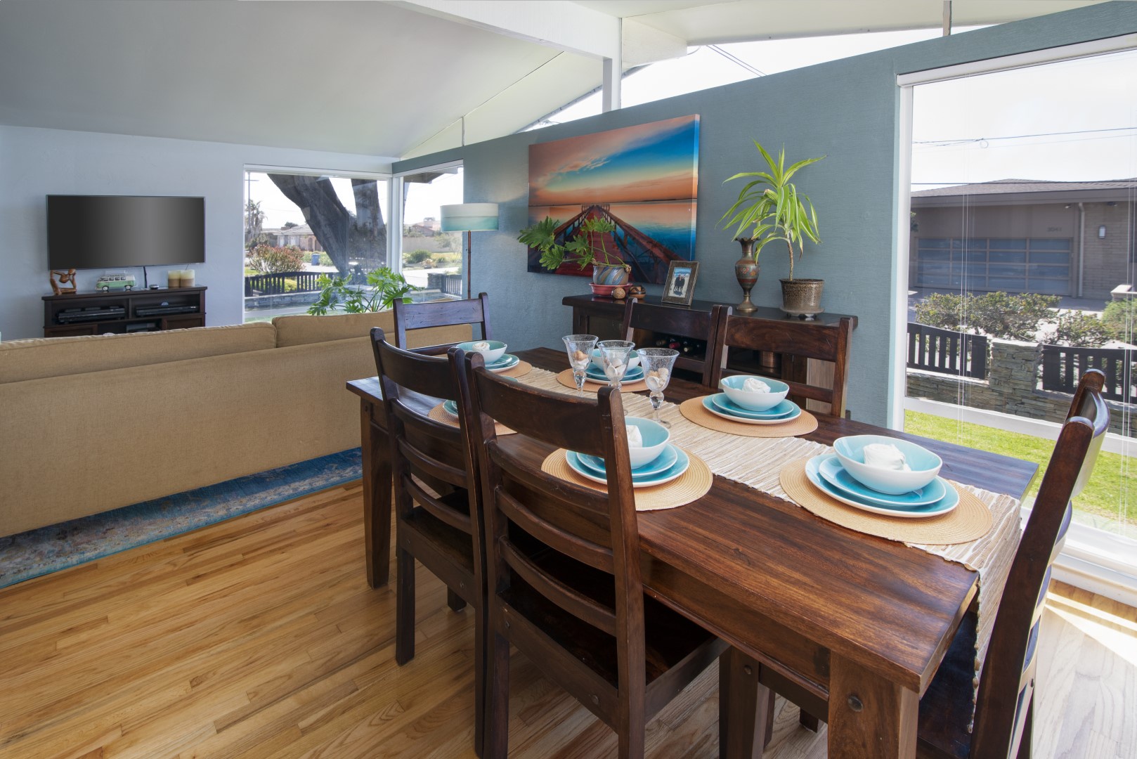 Enjoy ample natural light with floor to ceiling windows in dining and living room