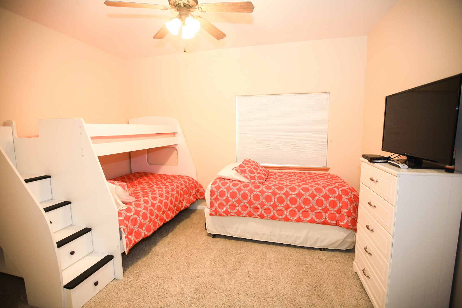 The third bedroom has a twin over full bunk bed and another twin.  It also has a tv.