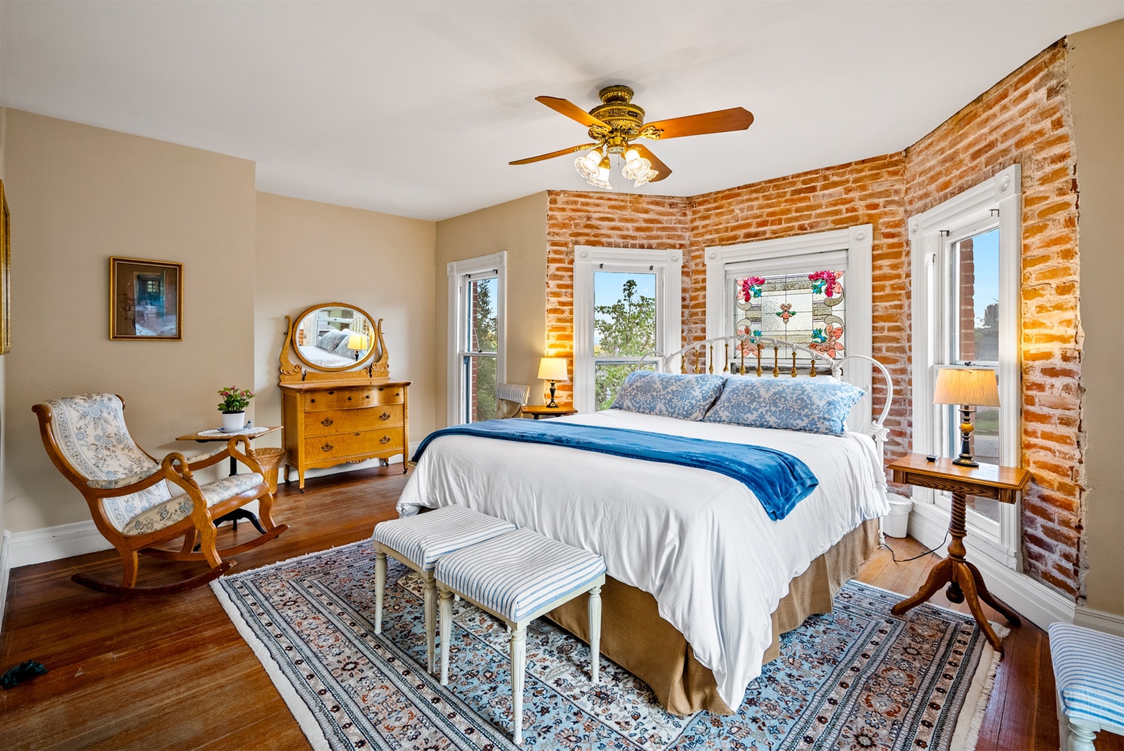 The master bedroom upstairs has a king bed and adjoining bathroom