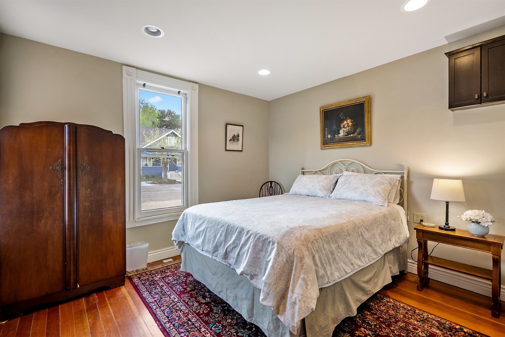 The fifth bedroom is the only one downstairs and has a queen bed