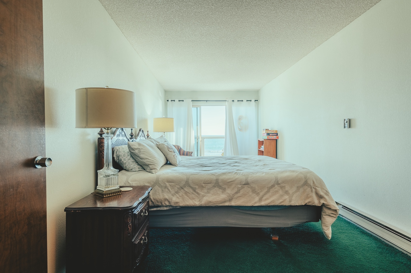 Wake up to ocean views from your comfortable bed and gentle morning light filling your peaceful retreat.