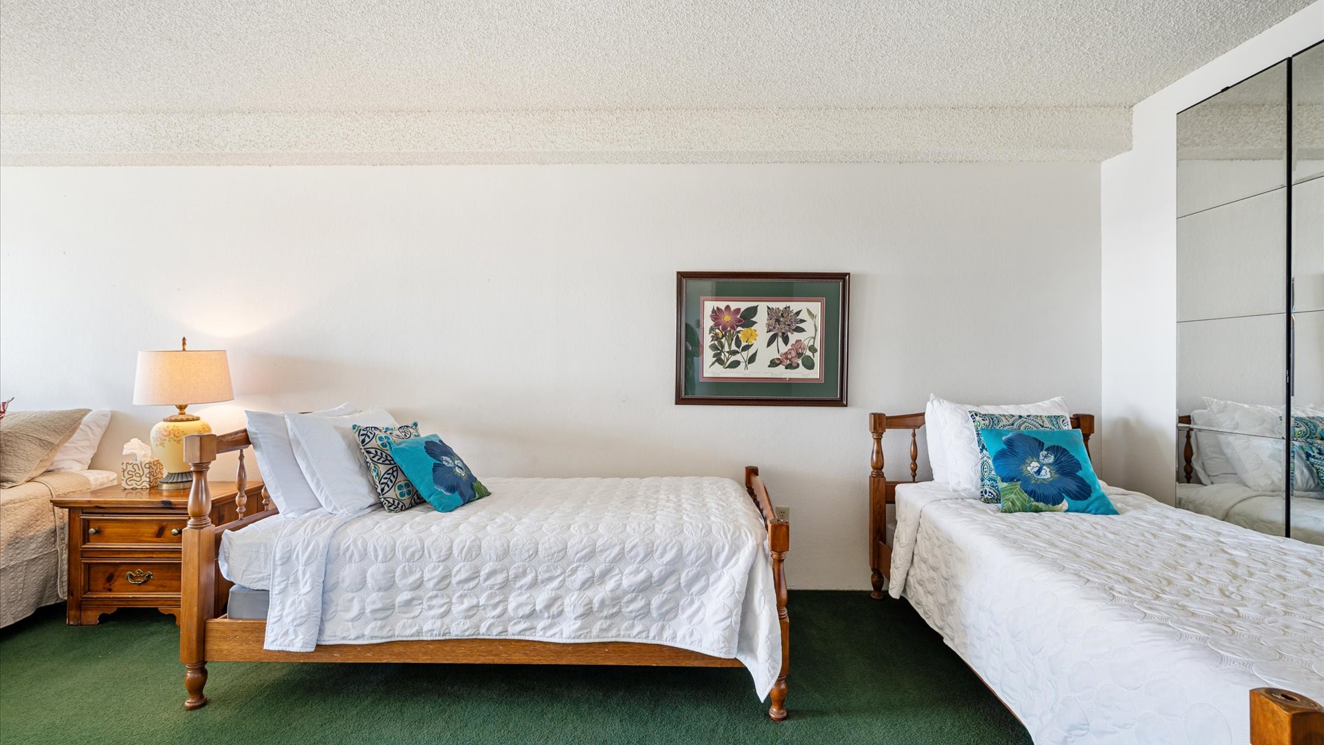 Ocean breezes and natural light fills this bedroom with beachside charm