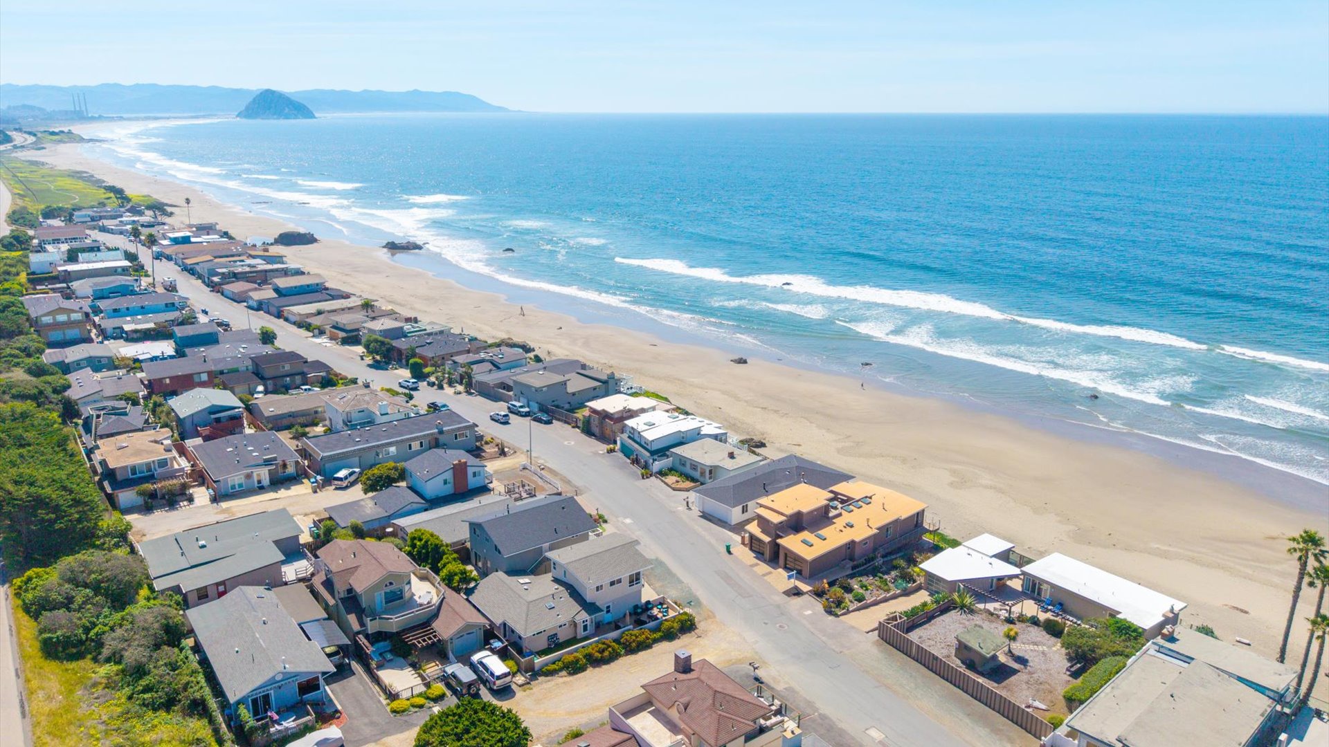 Beach access is a few homes down the street via a pathway