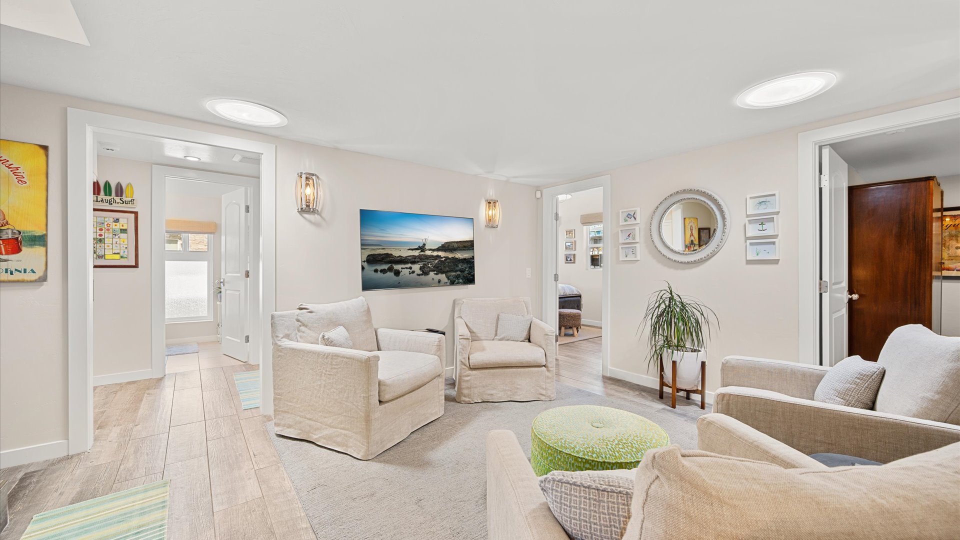 This cozy space features a flat screen tv and central gather place to relax