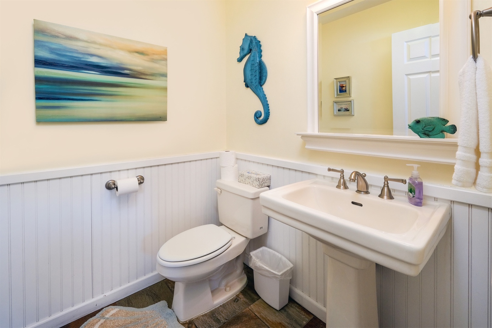 The half bath is upstairs and serves the common areas.