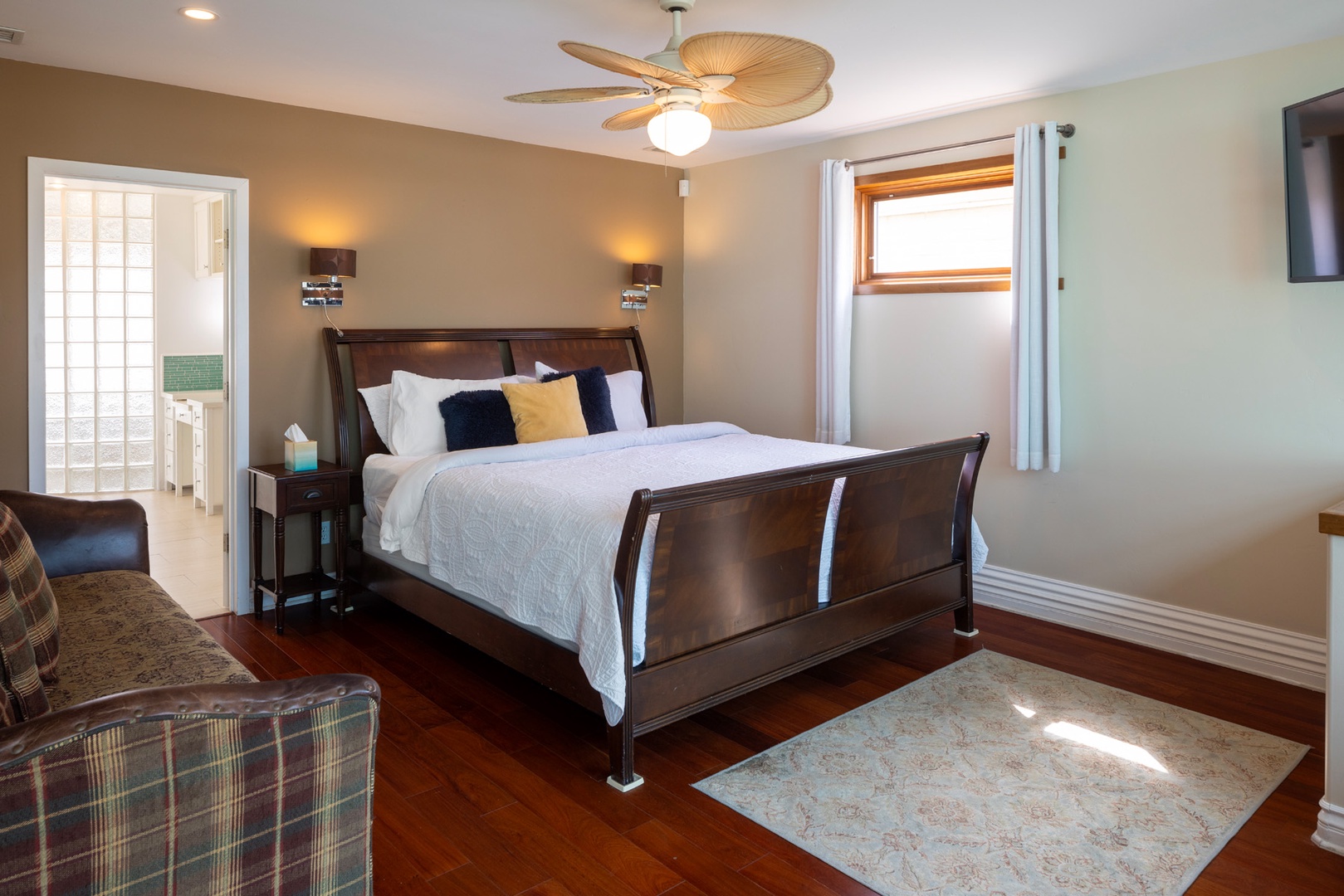 The primary bedroom has a king bed