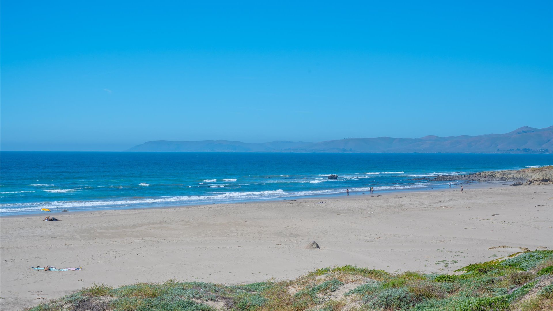 Spend your days at the beach and evenings relaxing in your home away from home
