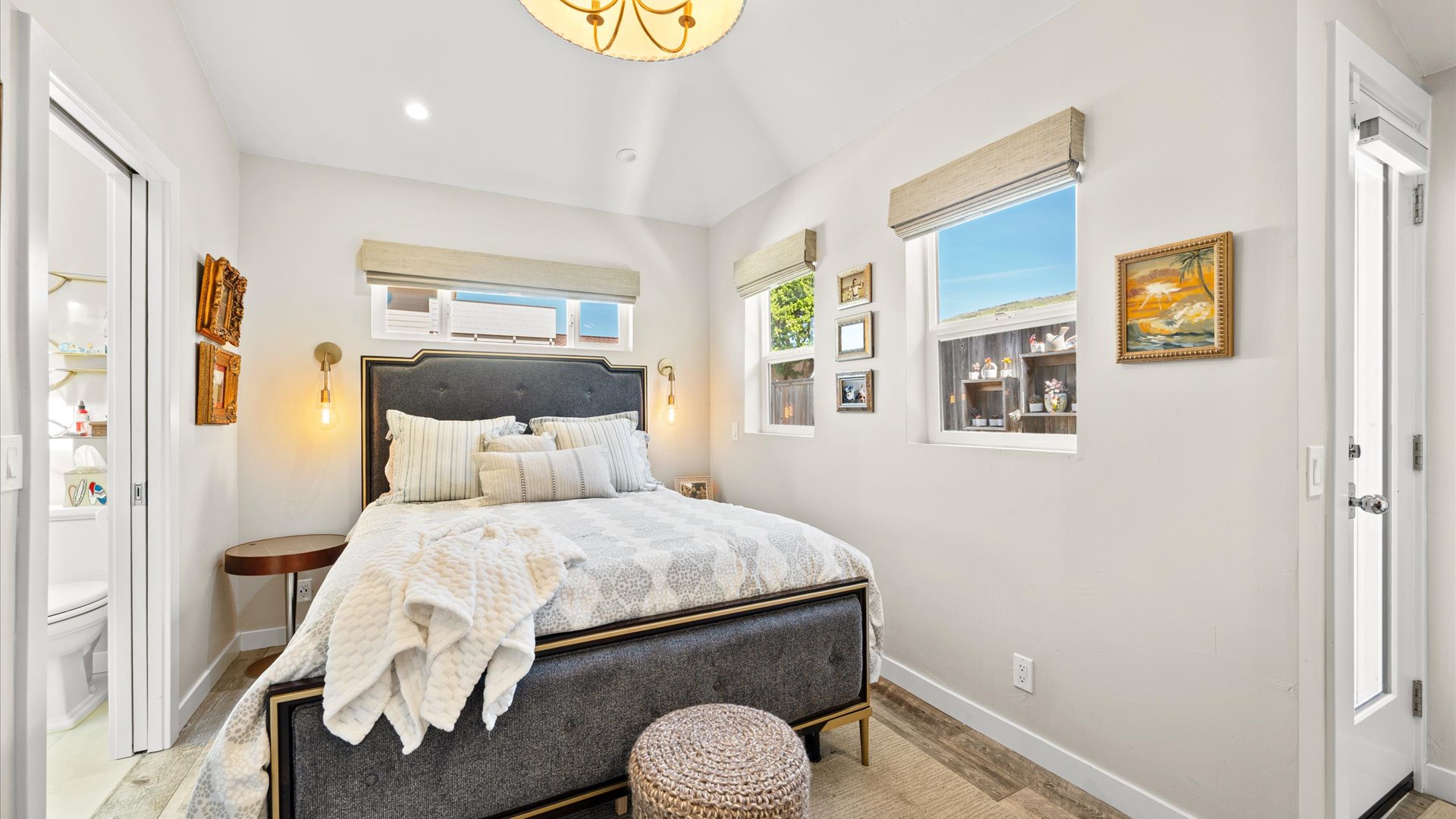 Master bedroom features a Queen size bed, flat screen tv, and ensuite full bathroom