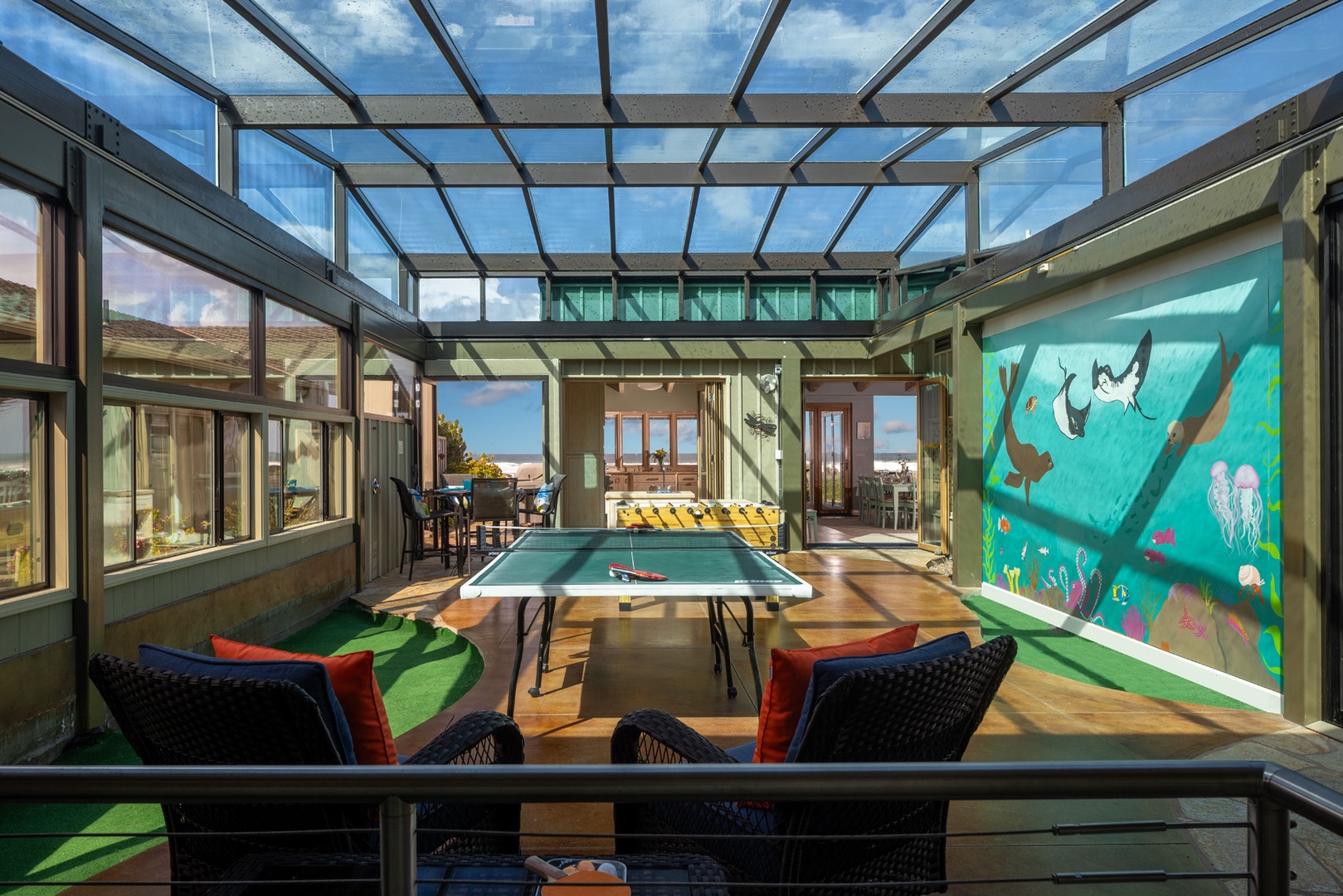 The beautiful atrium room has several games