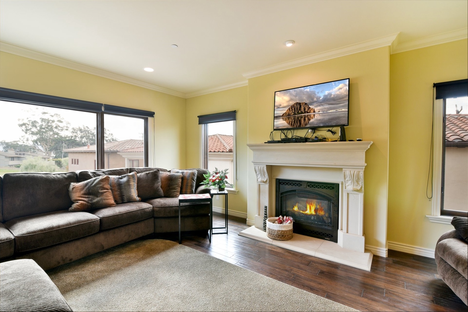 The living room has a flat screen TV and DVD