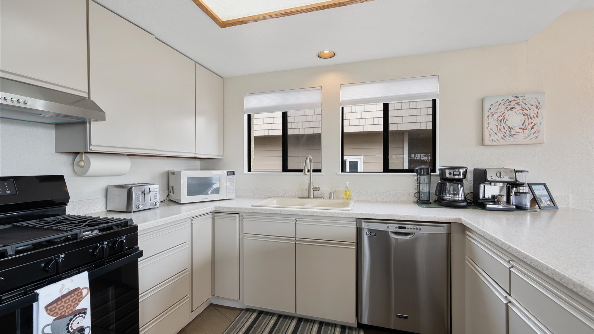 Modern appliances and generous counter space for preparing meals during your stay.