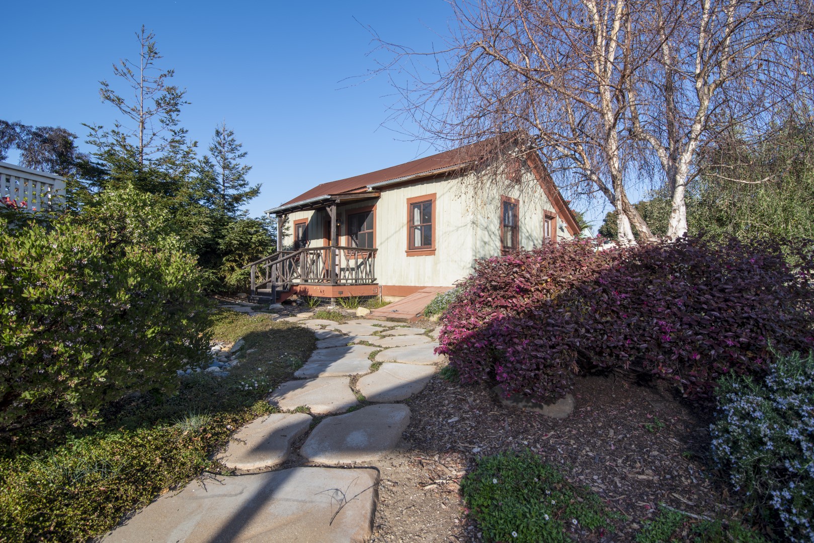 Enjoy the lush landscaping and spacious gardens