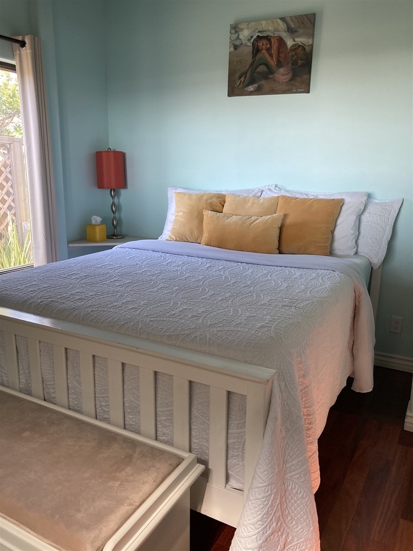 The fourth bedroom has a queen bed