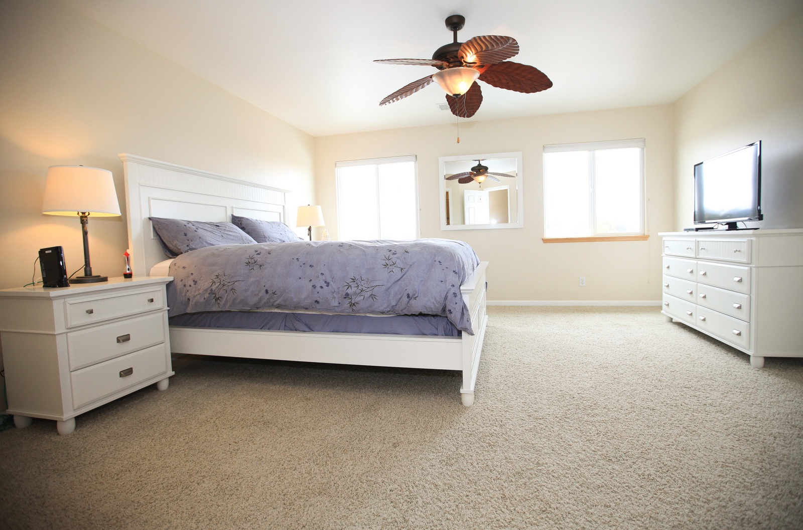 The master bedroom has a flat screen tv and large walk in closet.