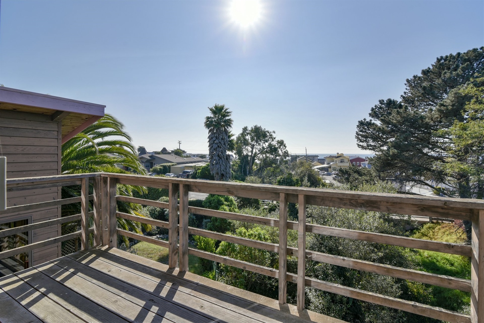 This balcony off the master bedroom includes peaks of the ocean