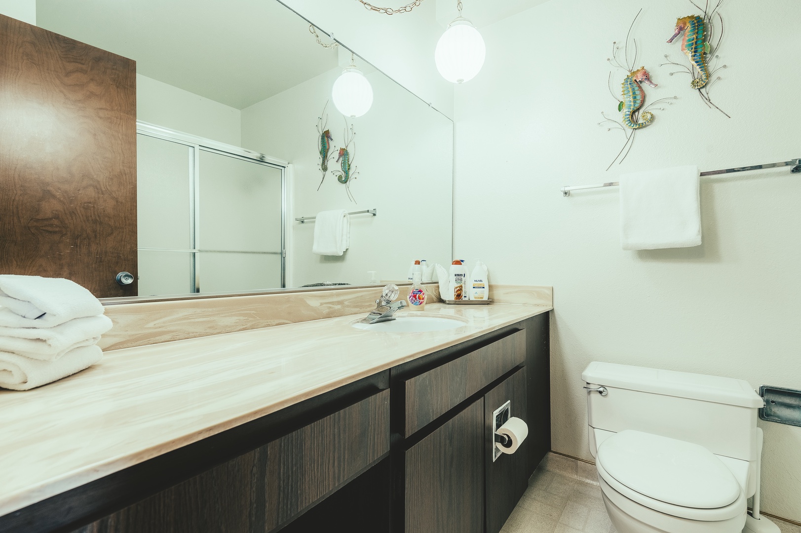 Hall bath located near the master and twin bedrooms features a tub/shower combo