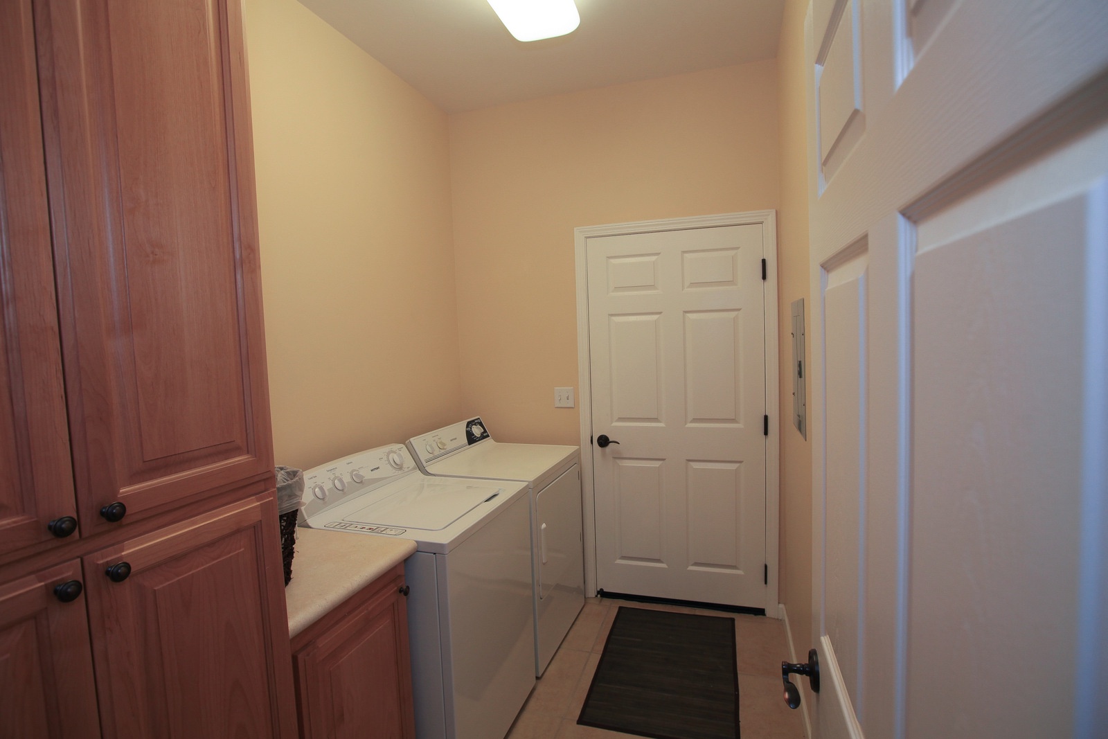 Laundry room is downstairs off the garage.