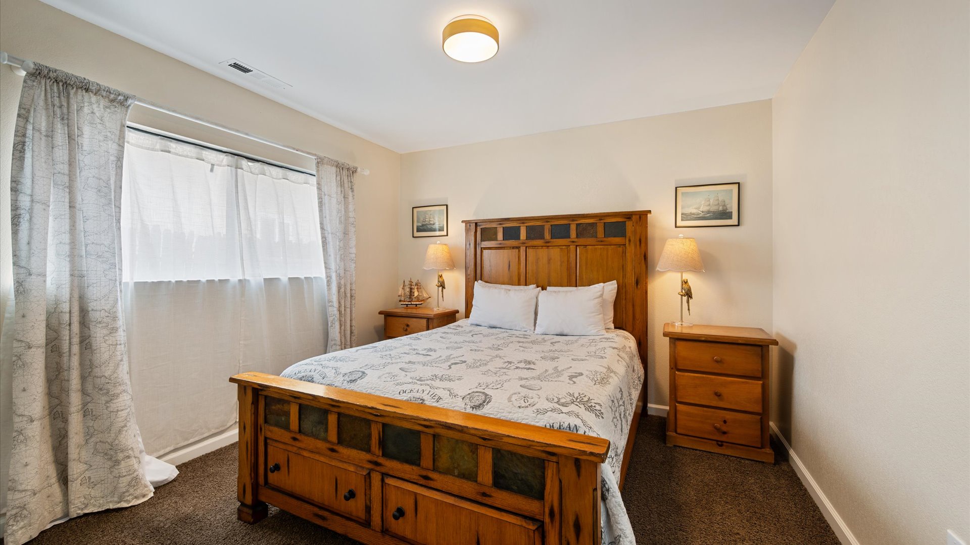 Second bedroom features a queen bed