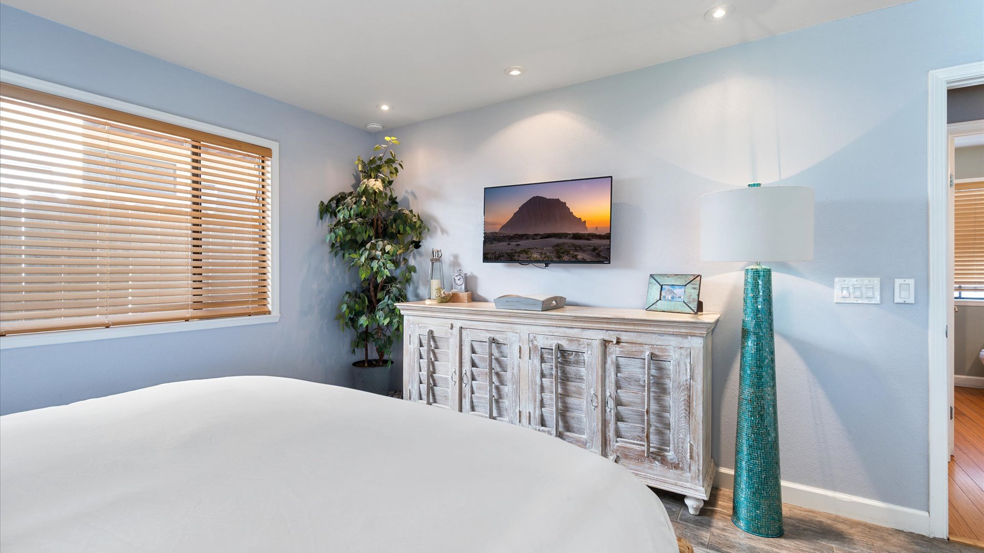 Master bedroom also features a large flat screen tv