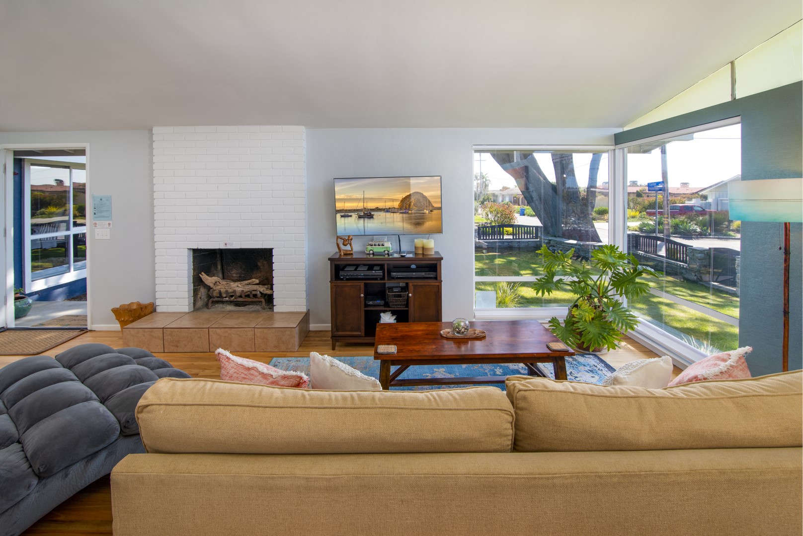 Relax with the flat screen tv and views of the ocean in the living room