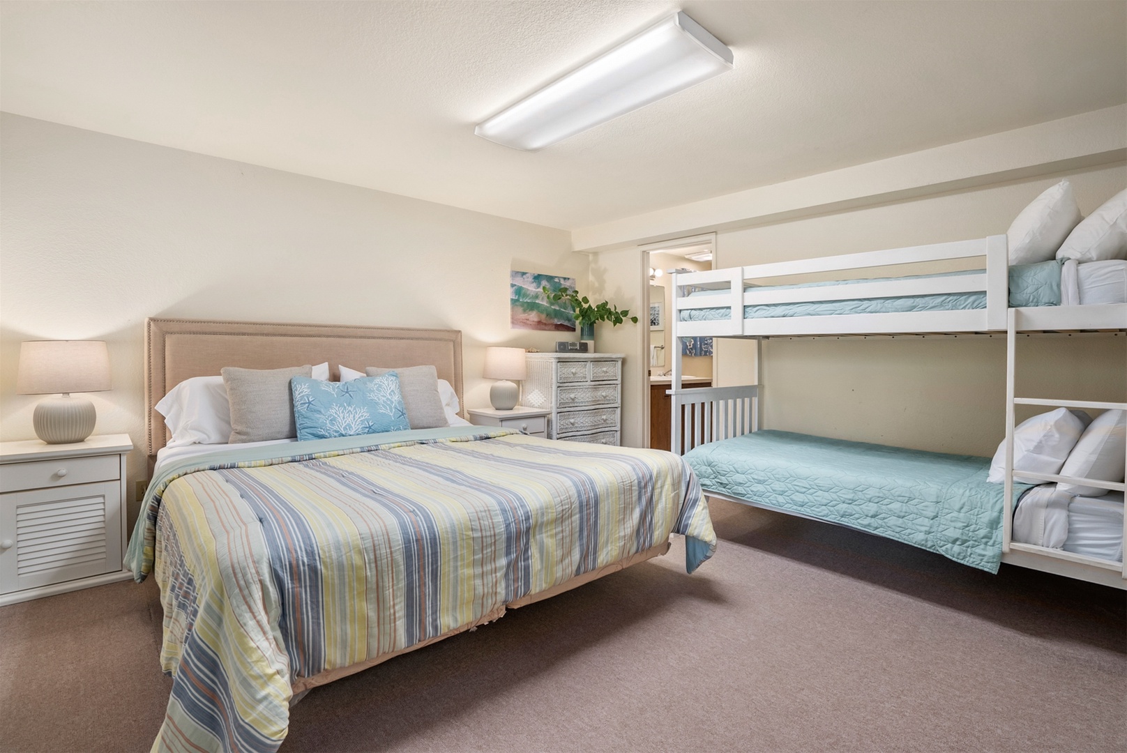 Also downstairs you`ll find the fifth bedroom that includes a king bed and another bunk bed.