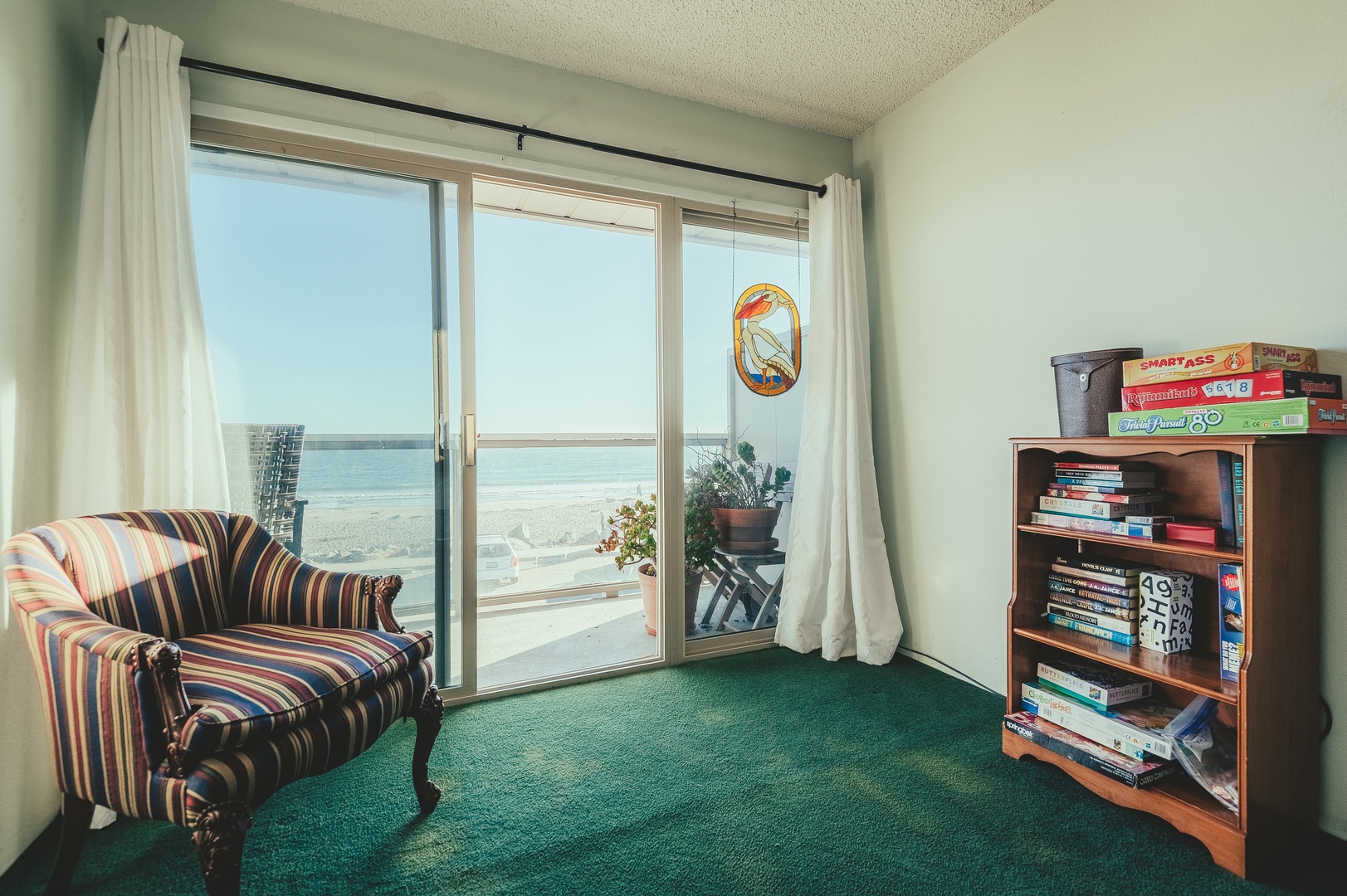 Curl up with a book in your cozy reading nook in the master, where ocean views and gentle breezes create the perfect backdrop for relaxation.