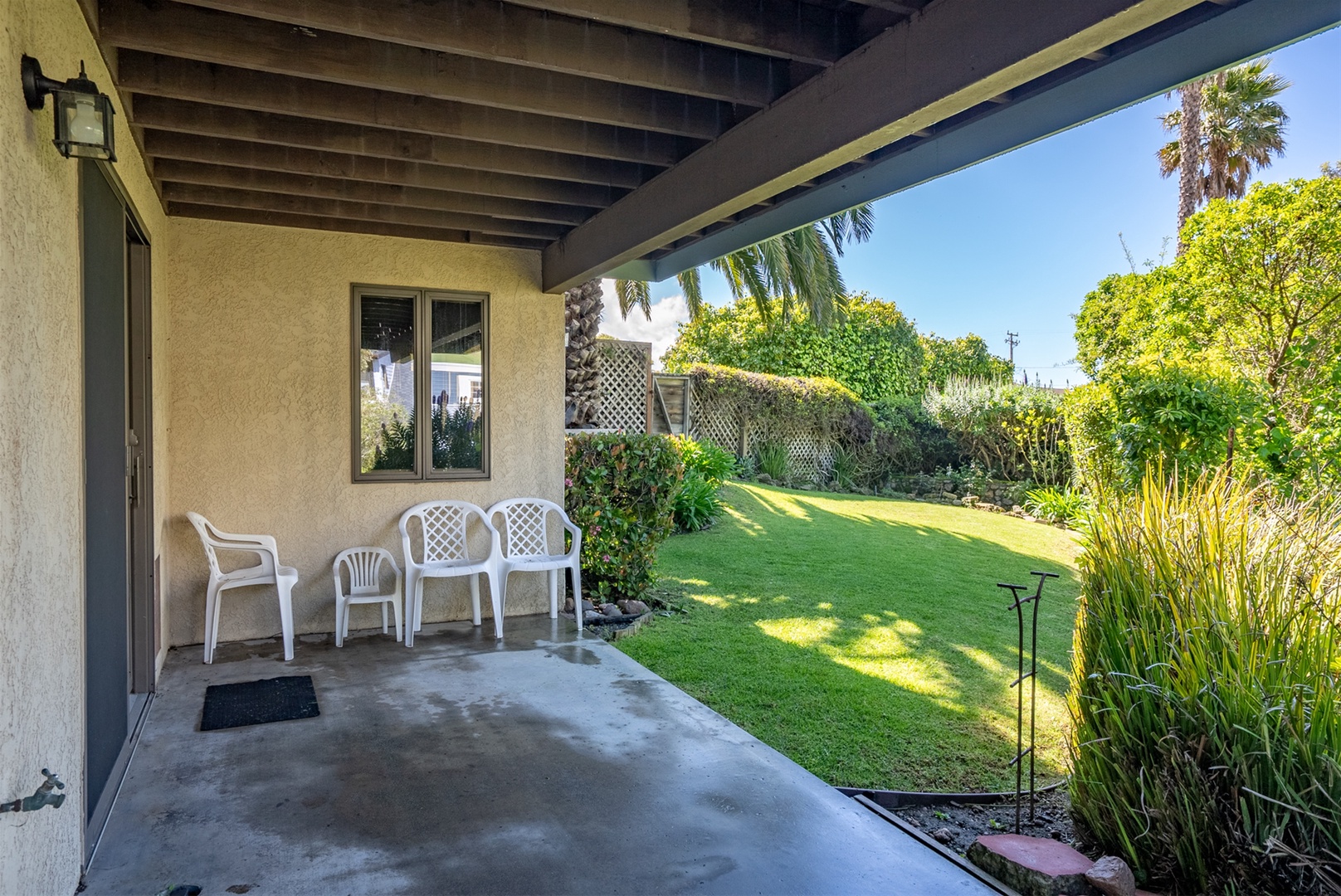 The downstairs suite offers backyard access.