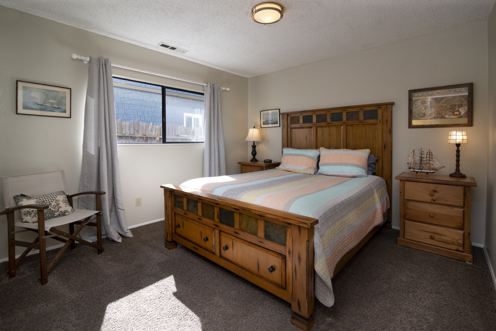 The second bedroom has a queen bed