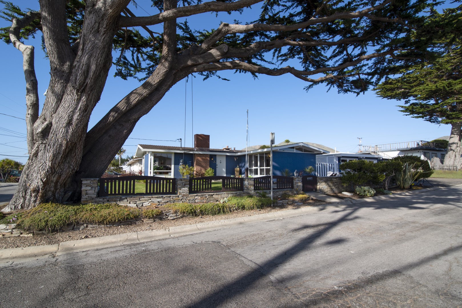 Home is located on a corner lot, just steps away from the beach