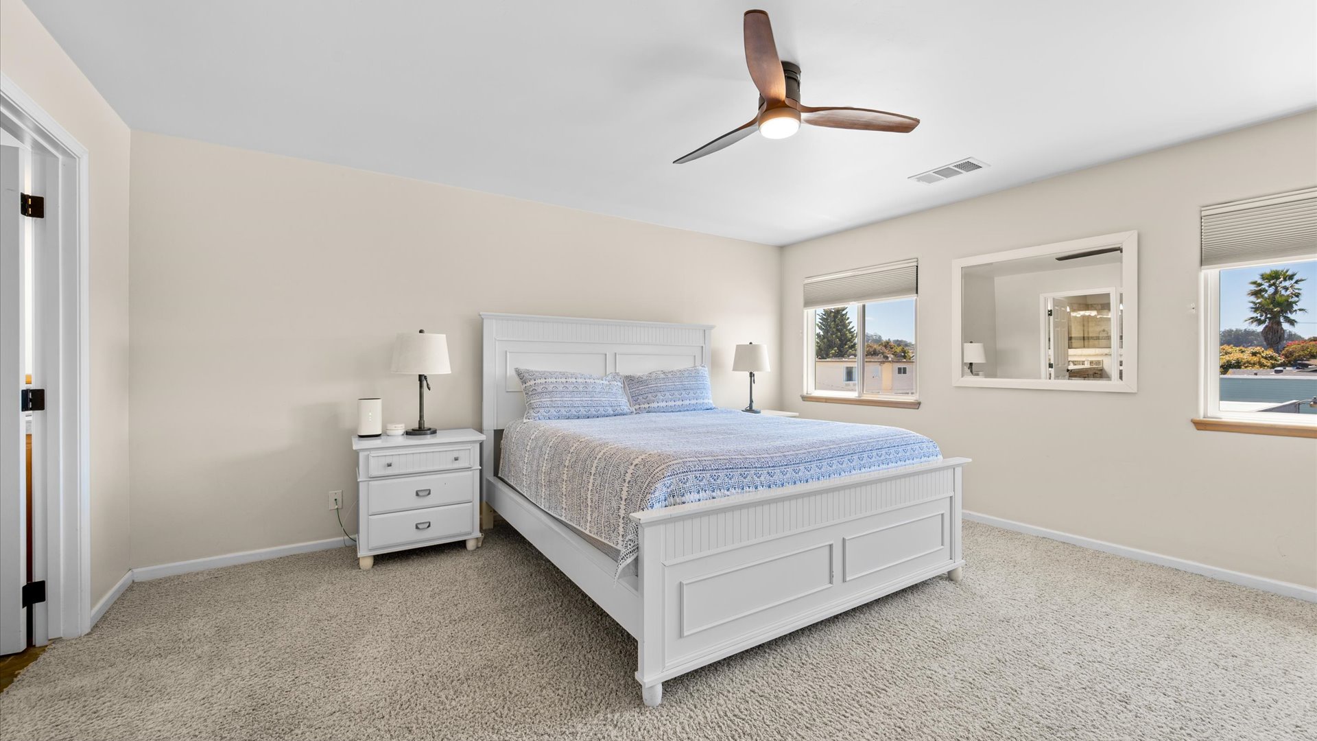 Upstairs is the master bedroom featuring a CA king sized bed