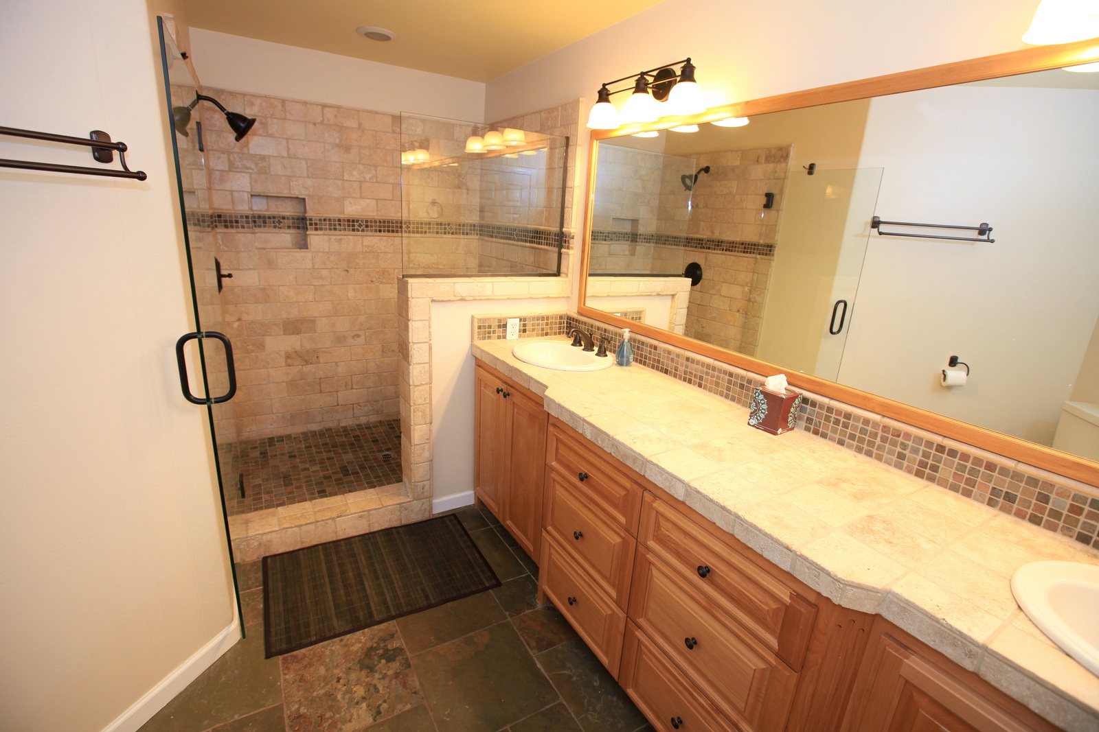 The beautiful master bath has a large step in shower and double vanity.