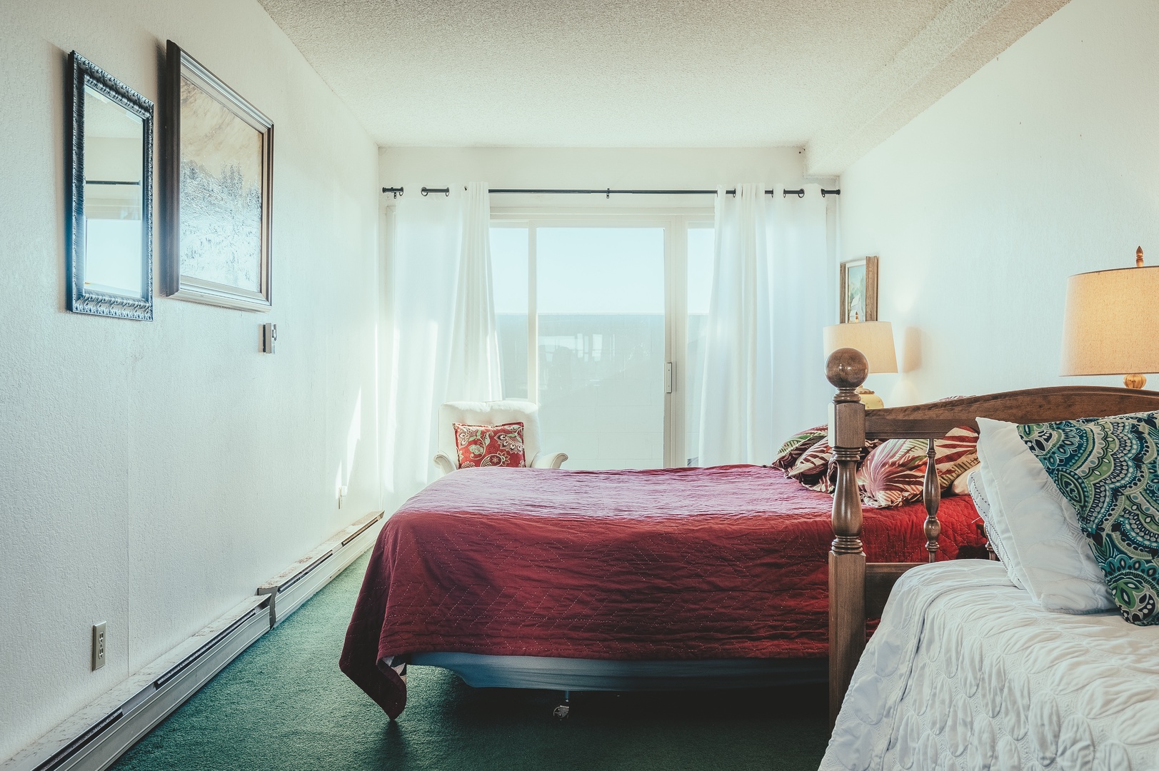 Ocean breezes and natural light fills this bedroom with beachside charm