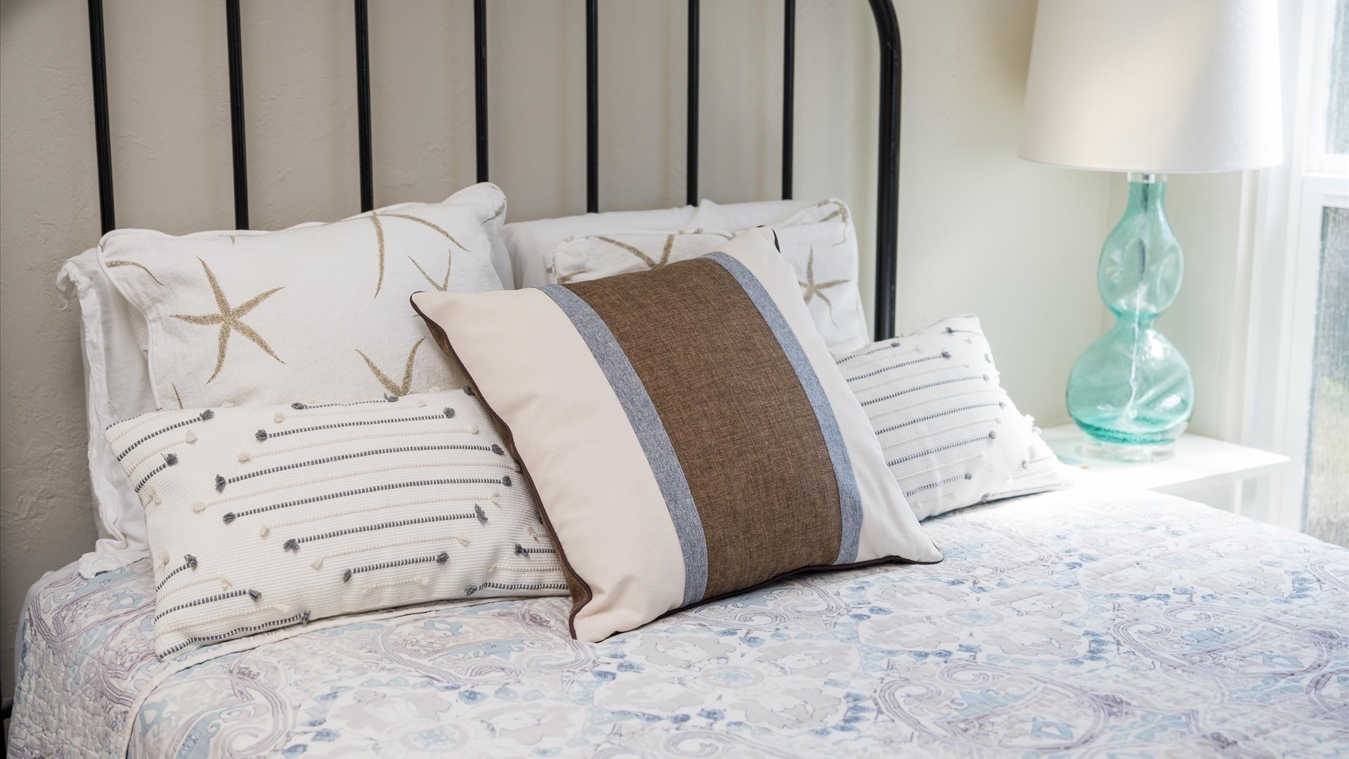 Coastal-inspired decor and touches help create the perfect beachside getaway