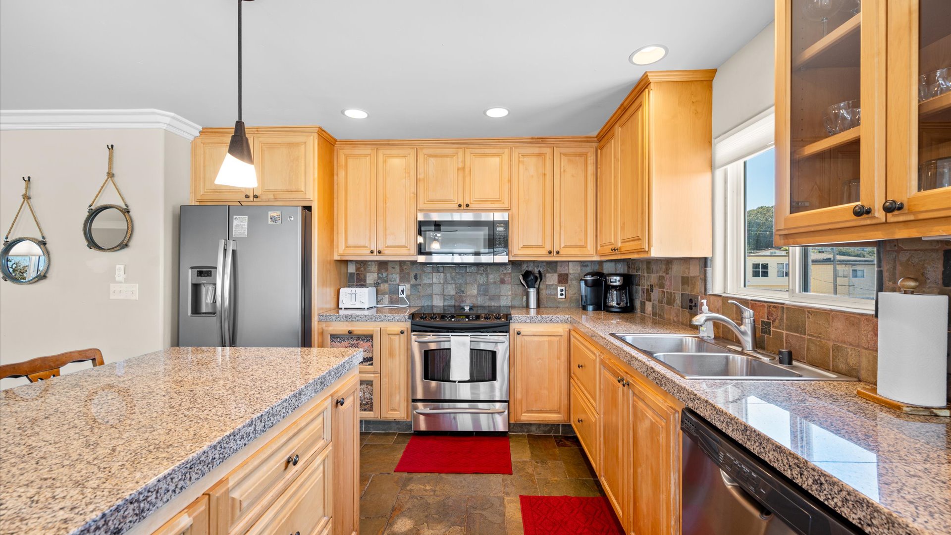 Your fully equipped kitchen awaits with stainless steel appliances