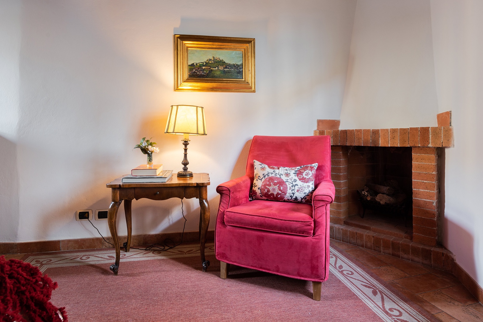 Curl up in the bedroom's cozy reading nook by the window. Fireplace is non-working.