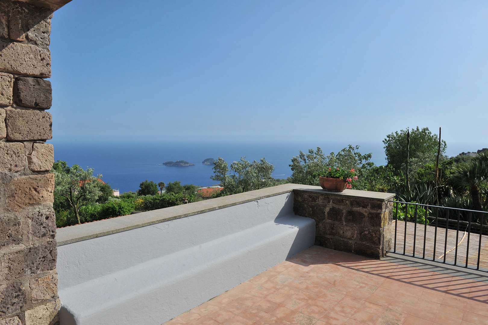 A large, sunny terrace reached from the exterior of the villa is right outside the two top bedrooms.