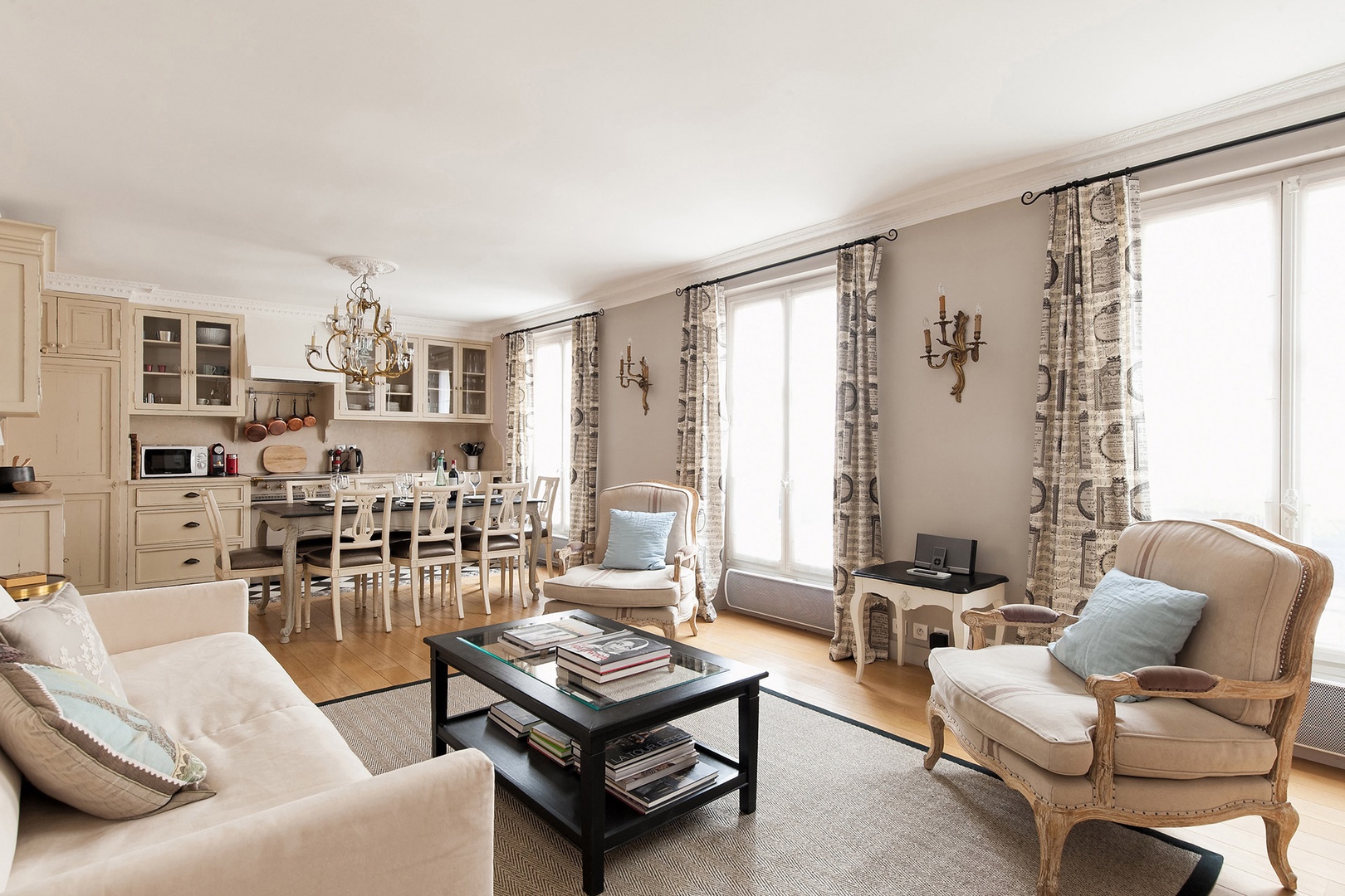 Large windows let in lots of light in the living room.