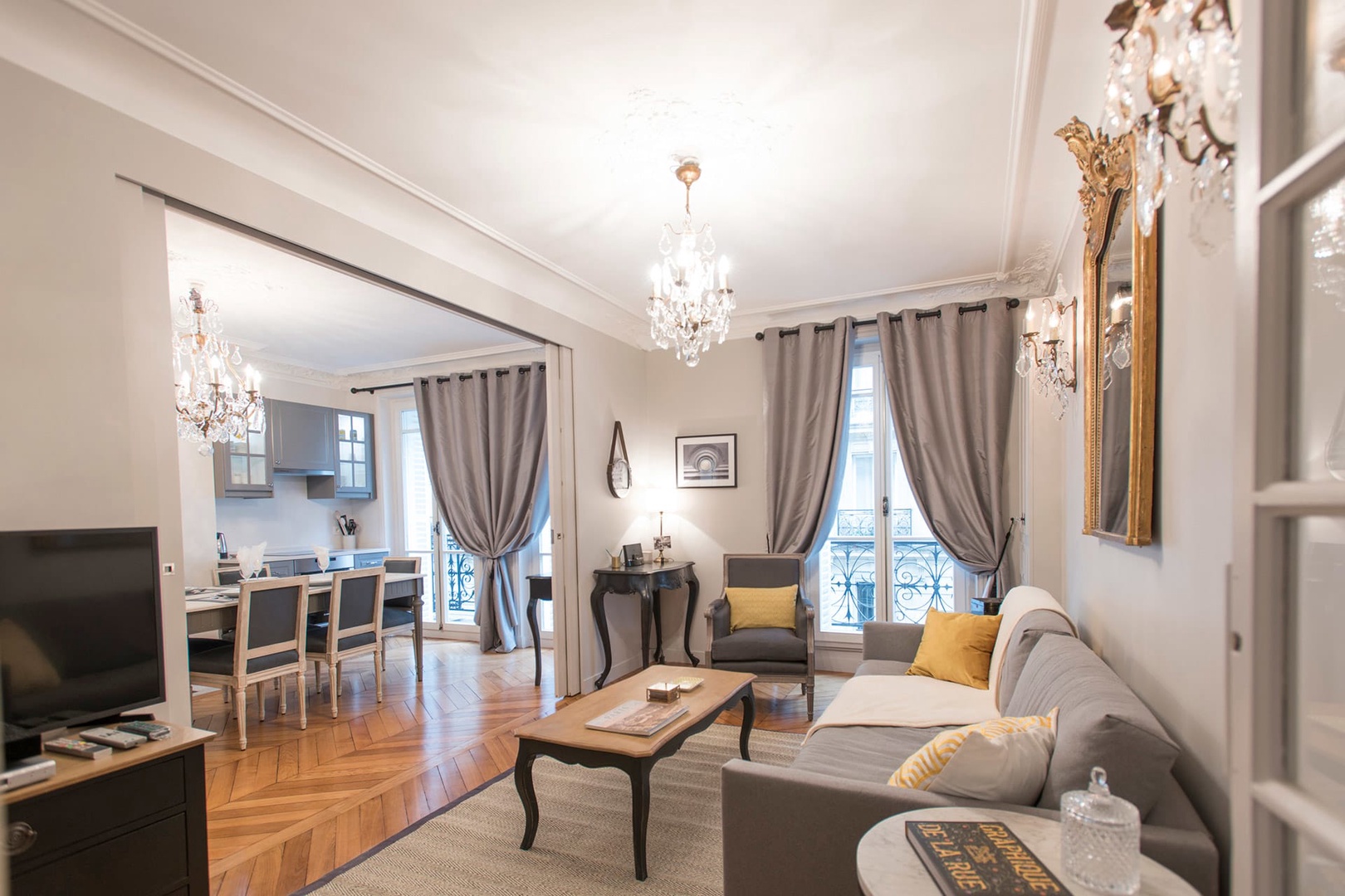 The living room leads seamlessly into the kitchen and dining area.