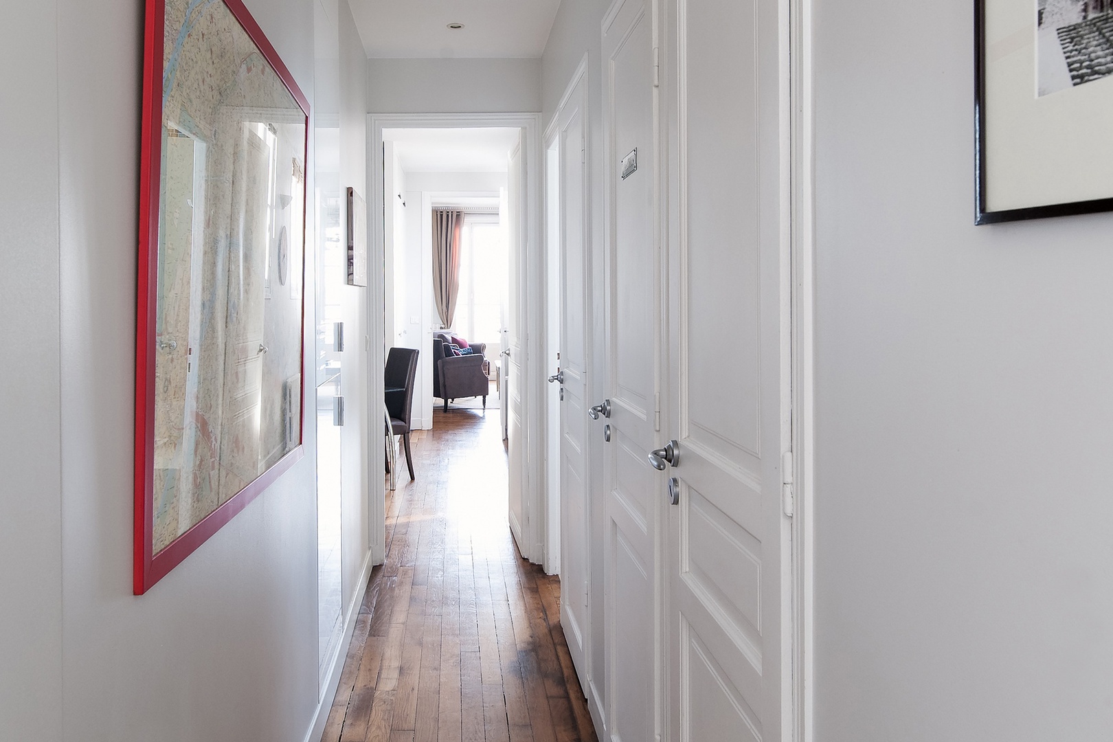 Hallway leading to bedrooms and bathrooms