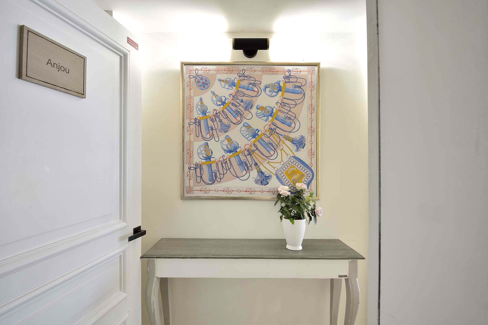 Step inside Anjou to find our Paris Perfect signature - a framed Hermès scarf.