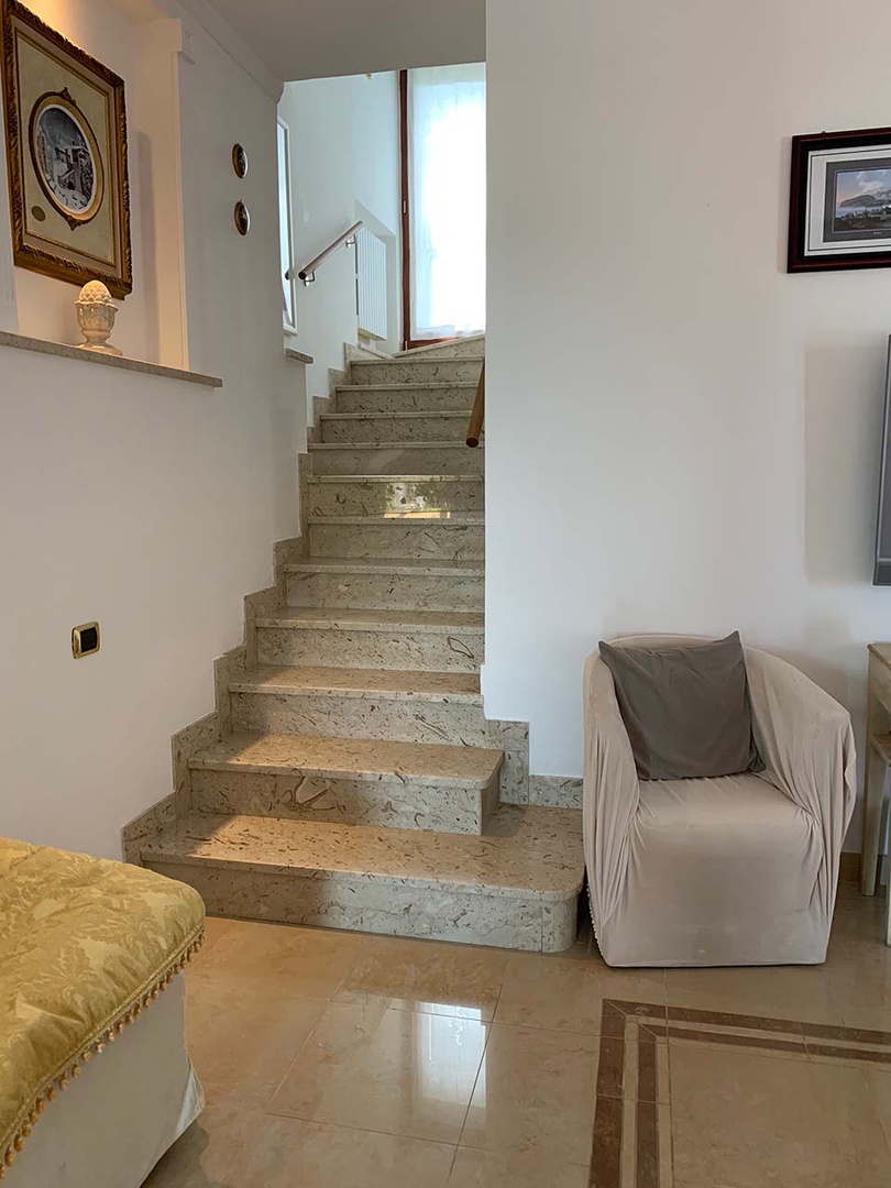 Stairs lead up to the second level.
