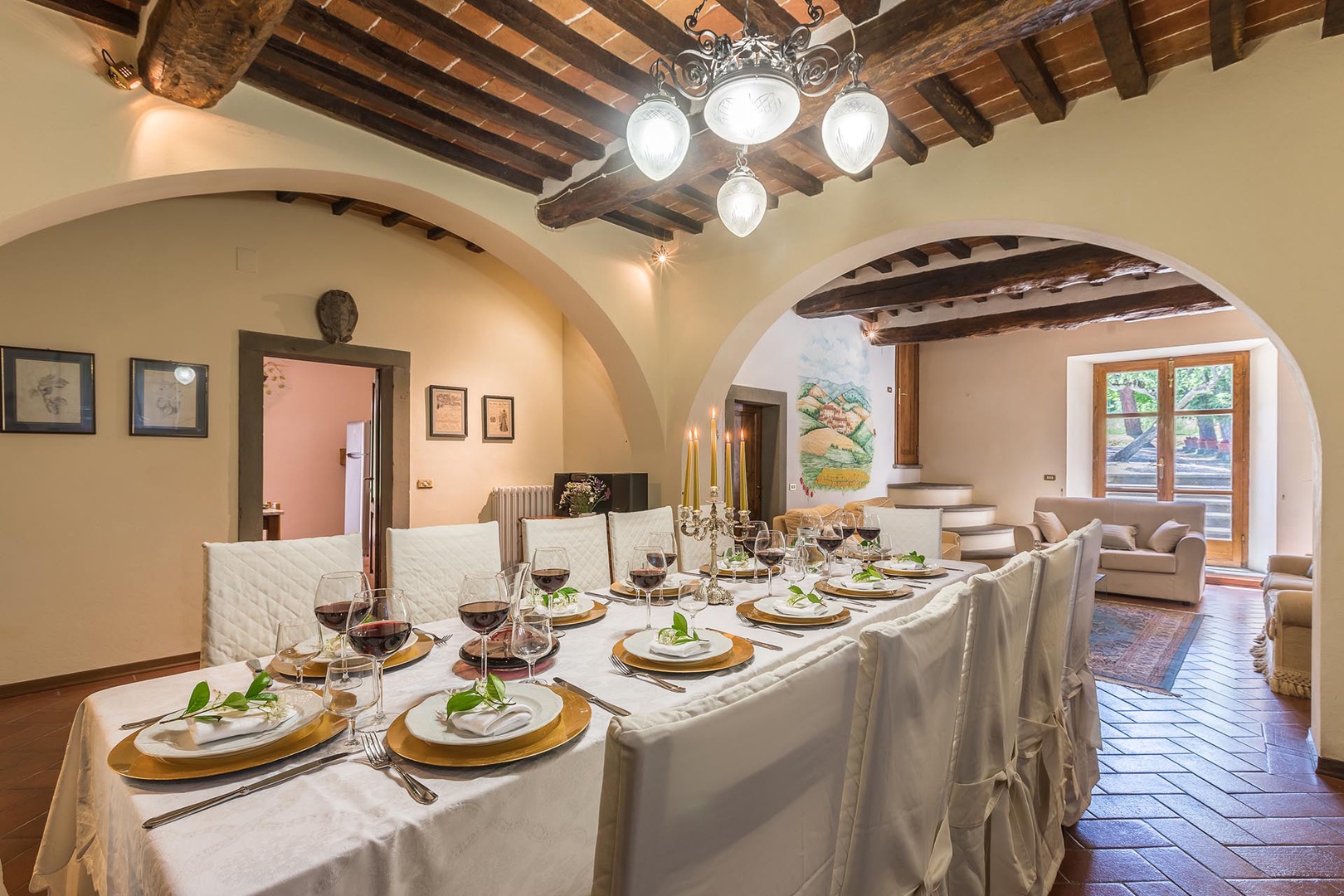 The archway in the back leads to the kitchen.