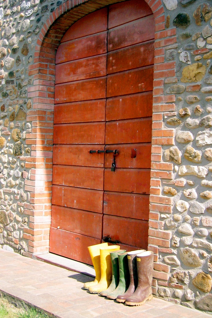 The doors below the house open to the cantina where the Chianti wine is made.