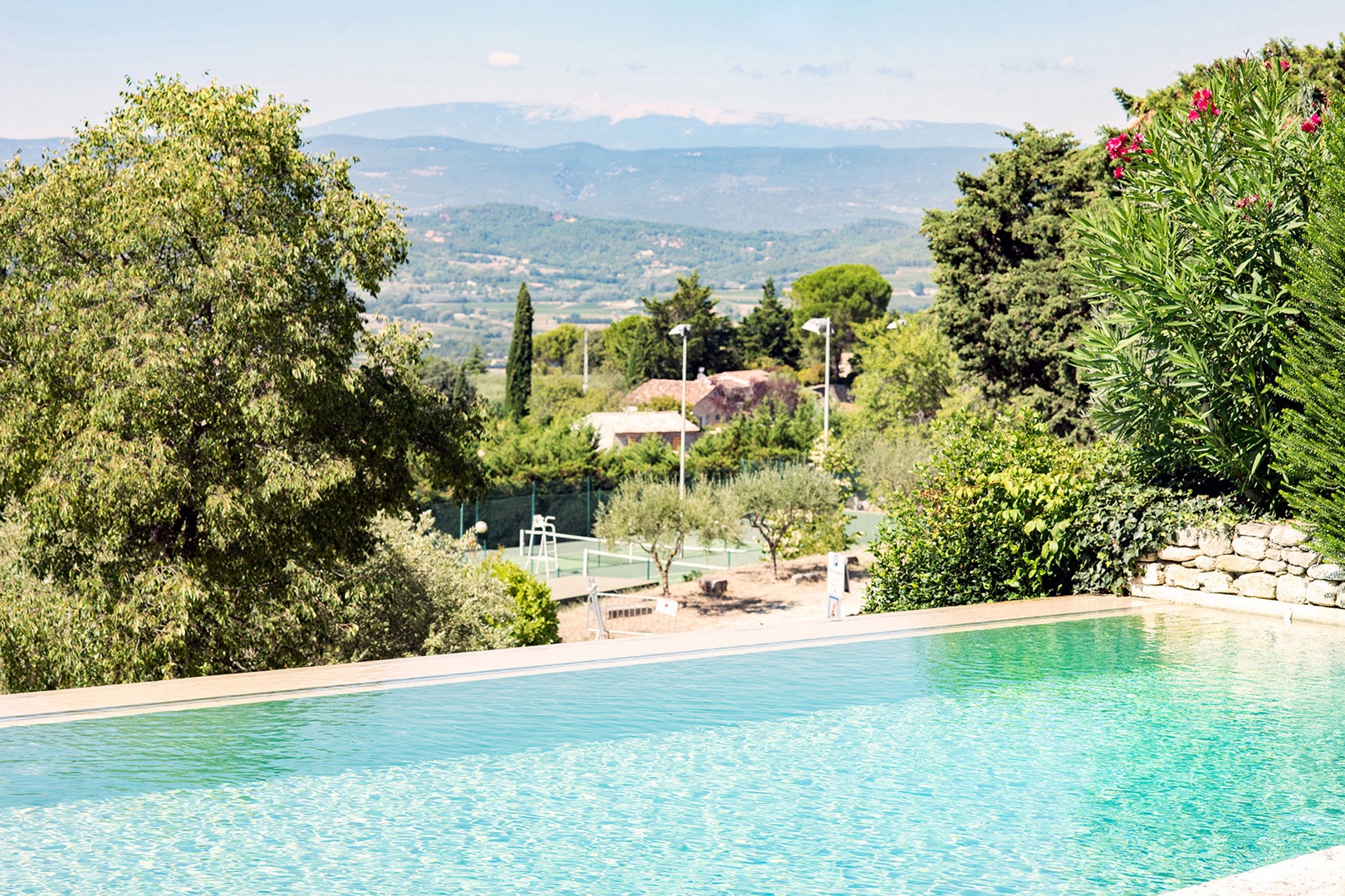 Stunning infinity pool with views overlooking the valley and mountains.