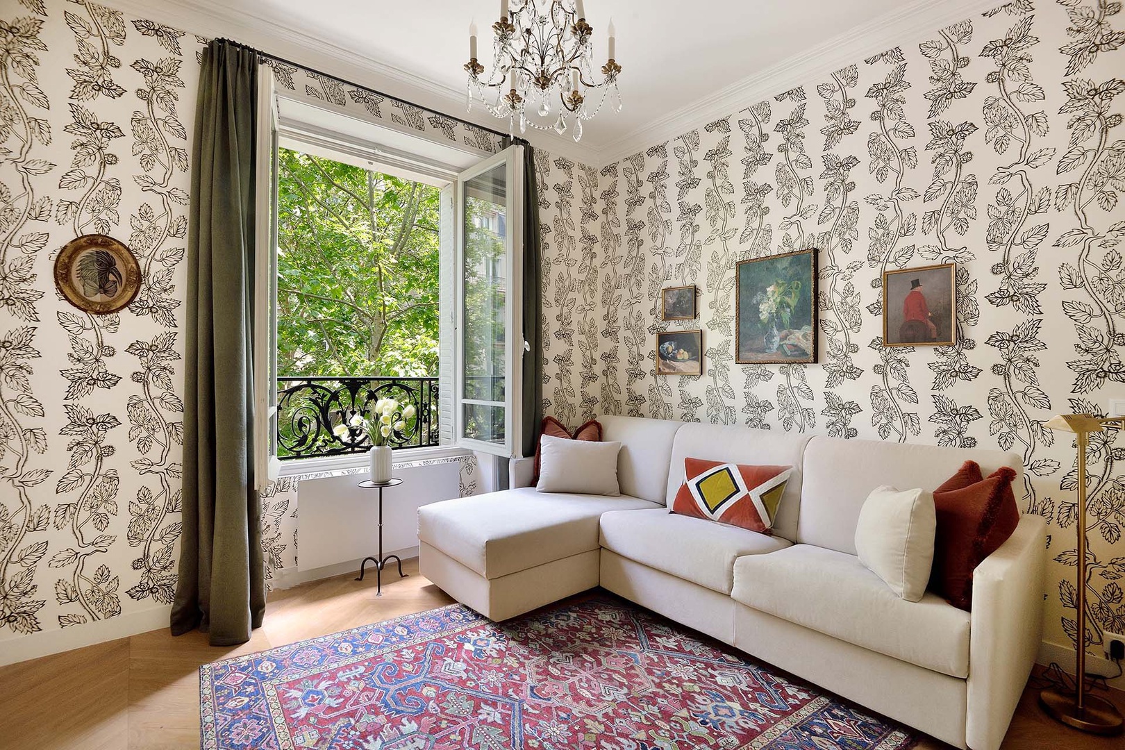 The sofa converts to a high-quality bed in this stylish second living room which doubles as a third bedroom.