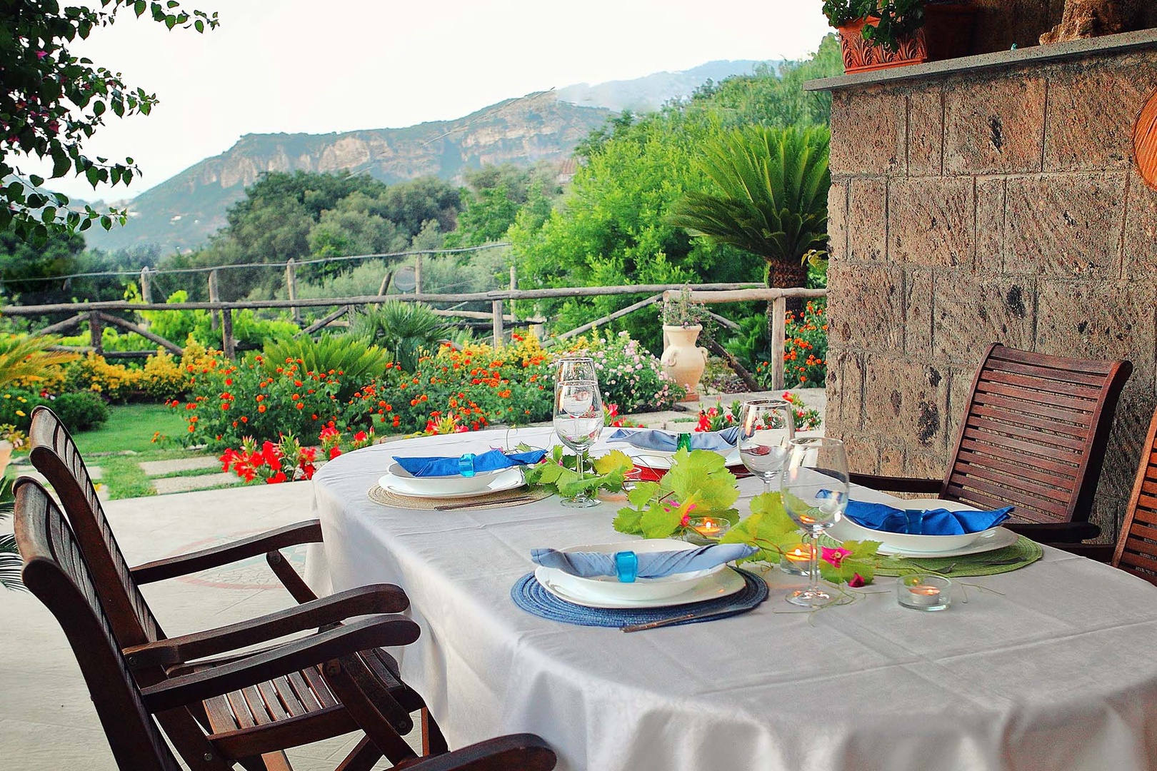 Outdoor covered patio with table for dining al fresco.