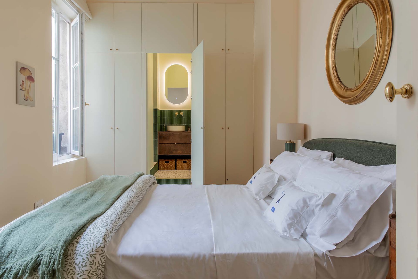 Serene bedroom with clever door hidden in custon wardrobe opens to en suite bathroom.