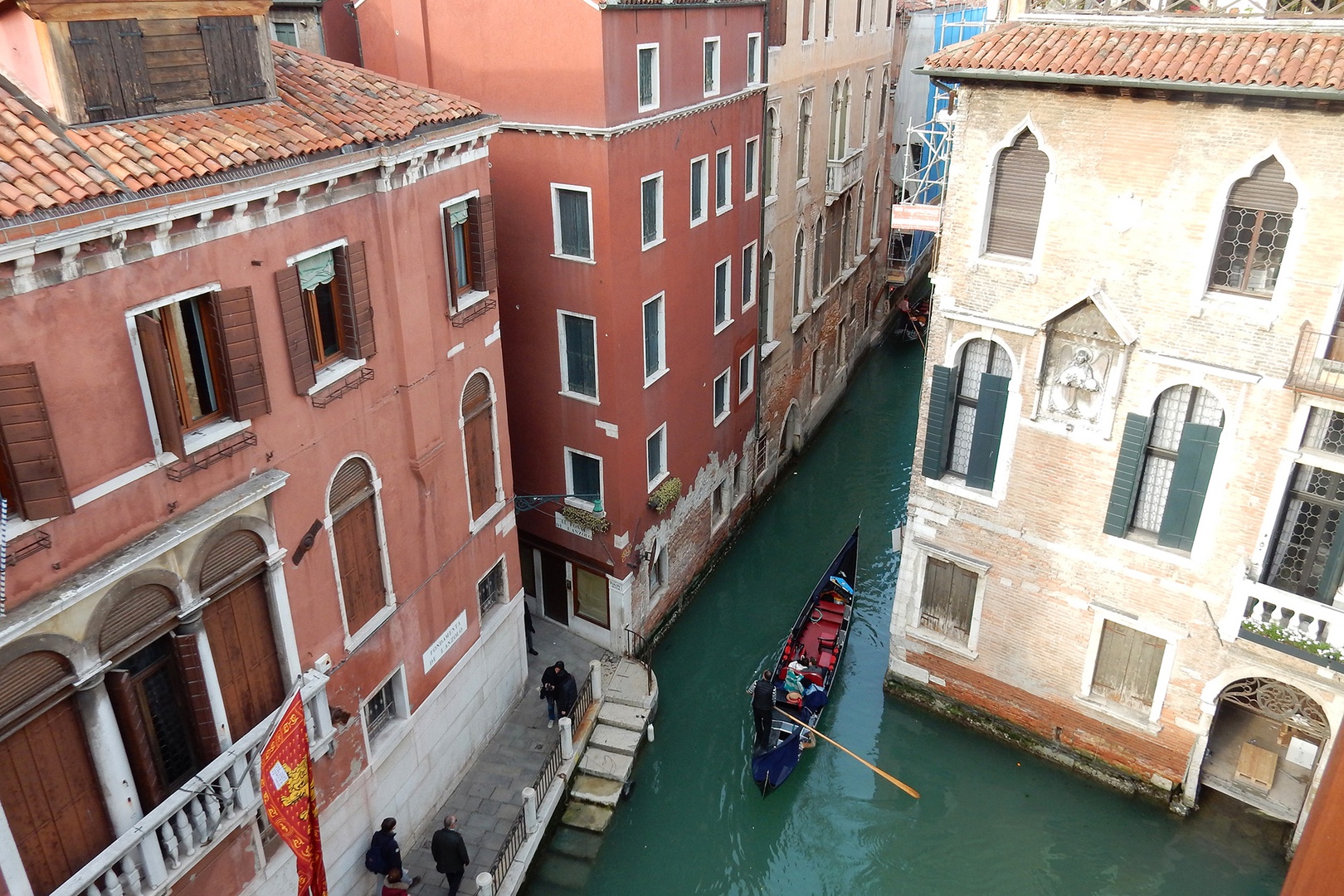 There is something mesmerizing about watching the gondolas as they glide by on the canal below.